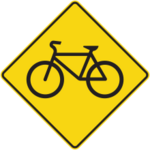 Sign with a yellow background showing a bicycle.