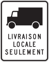 Un panneau rectangulaire contenant dans sa partie supérieure la silhouette noire d’un camion, vu de côté. L’indication « LIVRAISON LOCALE SEULEMENT » se trouve dans la partie inférieure, en majuscules.