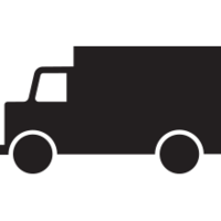 La silhouette noire d’un camion, vu de côté.