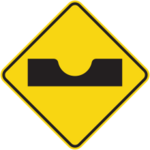 Sign with yellow background showing a funnel-shaped descent