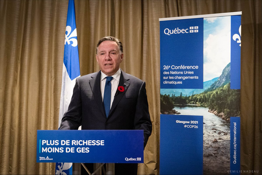 M. Legaults derrière le lutrin lors de la 26e Conférence de Parties à la Convention-cadre des Nations Unies sur le climat